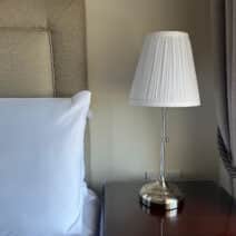 upclose picture of a lamp in bedroom
