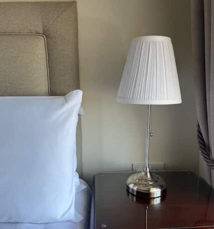 upclose picture of a lamp in bedroom