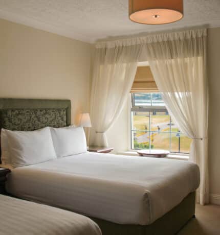 Twin room at The Walter Raleigh Hotel can accommodate 2 people.