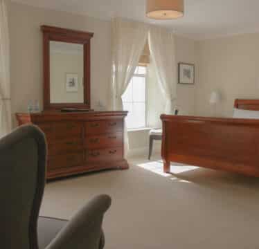 Junior Suite at The Walter Raleigh Hotel accommodate 2 people.