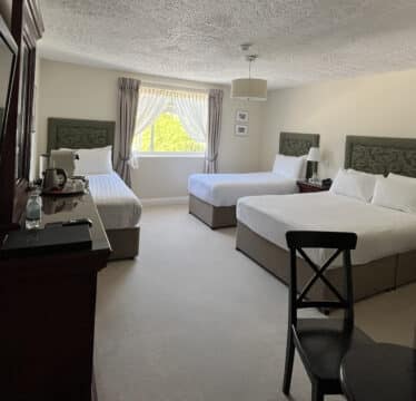 Family rooms at The Walter Raleigh Hotel can accommodate 2 adults and 2 children.