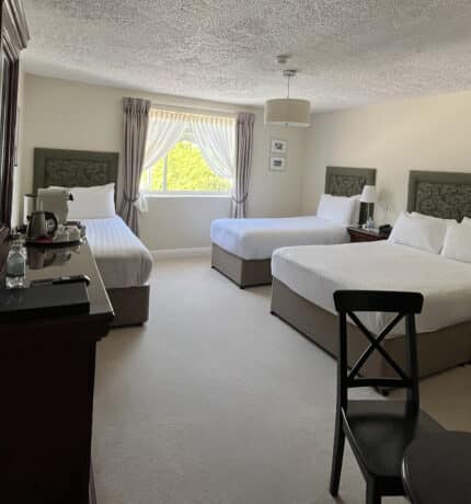 Family rooms at The Walter Raleigh Hotel can accommodate 2 adults and 2 children.