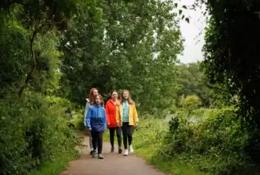 Family walking on a break away at The Walter Raleigh Hotel in East Cork.