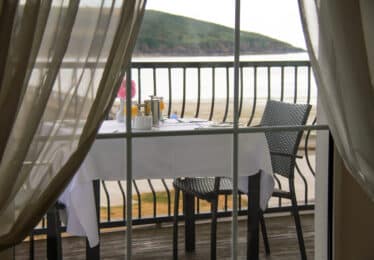 breakfast setting on the terrace over looking Youghal Bay