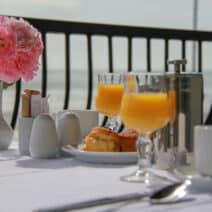 upclose setting of breakfast with orange juice