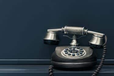 old phone against black background