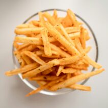 Chips in a bowl with a white background