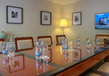 meeting room with walter raleigh water bottles